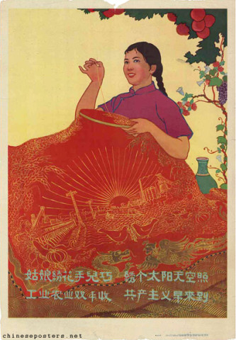 A young woman embroiders flowers with skillful hand ...