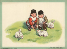 Older brother and younger sister feed small white rabbits